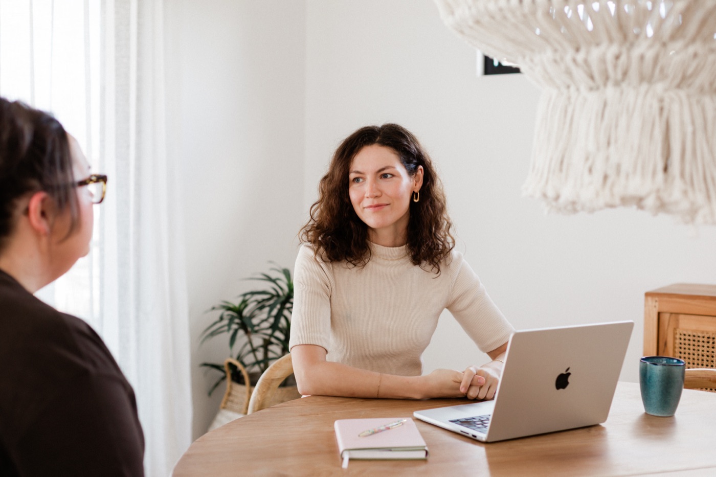 Tiffany, principal bookkeeper at True Tally Bookkeeping, working with a small business owner